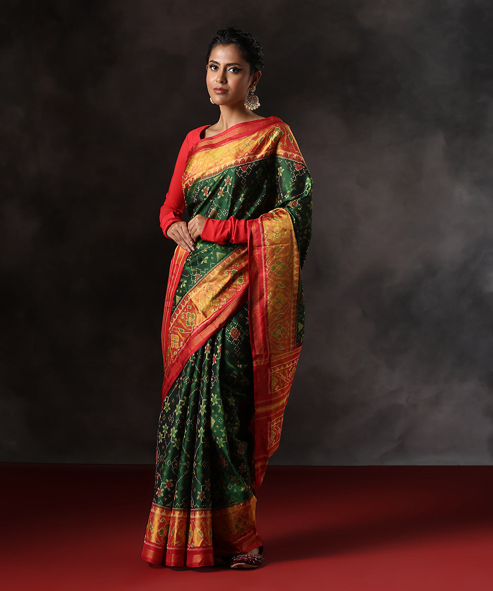 Green_Handloom_Pure_Mulberry_Silk_Single_Ikat_Patola_Saree_With_Red_Tissue_Border_WeaverStory_02