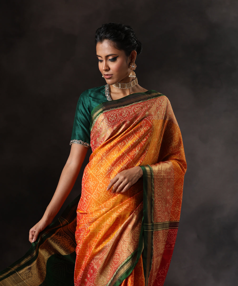 Handloom_Yellow_Pure_Mulberry_Silk_Single_Ikat_Patola_Saree_With_Green_Tissue_Border_WeaverStory_01