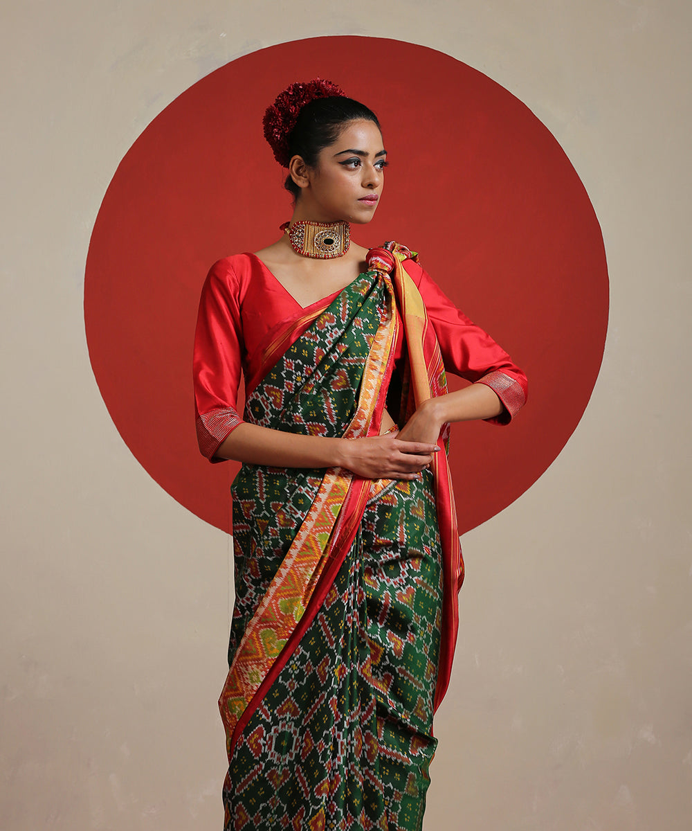 Green_Handloom_Pure_Mulberry_Silk_Patola_With_Red_Tissue_Border_Saree_WeaverStory_01