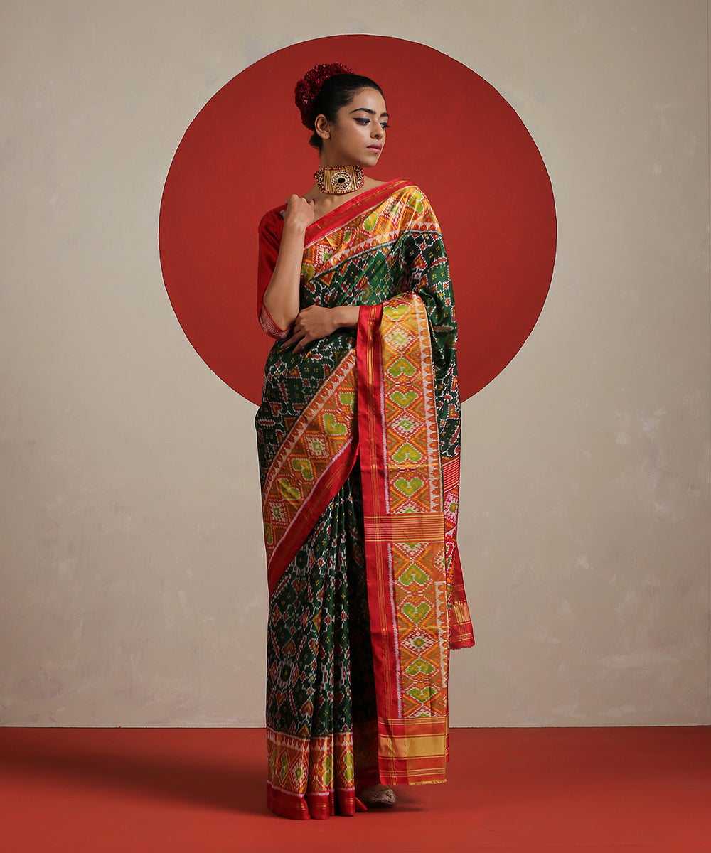 Green_Handloom_Pure_Mulberry_Silk_Patola_With_Red_Tissue_Border_Saree_WeaverStory_02