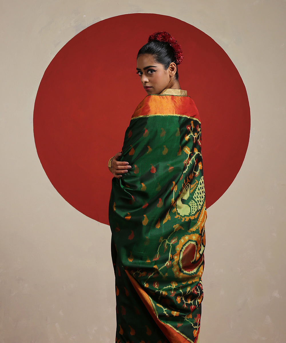 Handloom_Dark_Green_Pure_Mulberry_Silk_Single_Ikat_Patola_With_Tissue_Border_Saree_WeaverStory_01