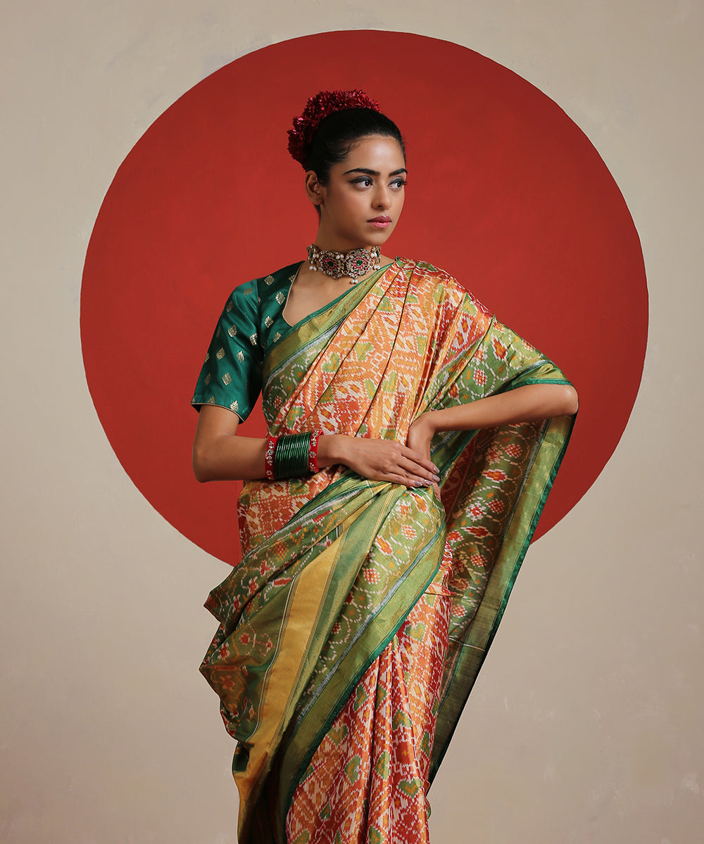 Handloom_Green_And_Mustard_Double_Shade_Tissue_Silk_Ikat_Patola_Saree_WeaverStory_01