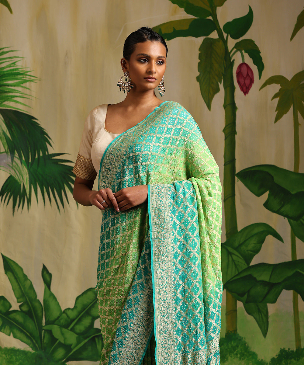 Turquoise_And_Neon_Green_Handloom_Pure_Georgette_Banarasi_Bandhej_Saree_With_Zari_Jaal_WeaverStory_01