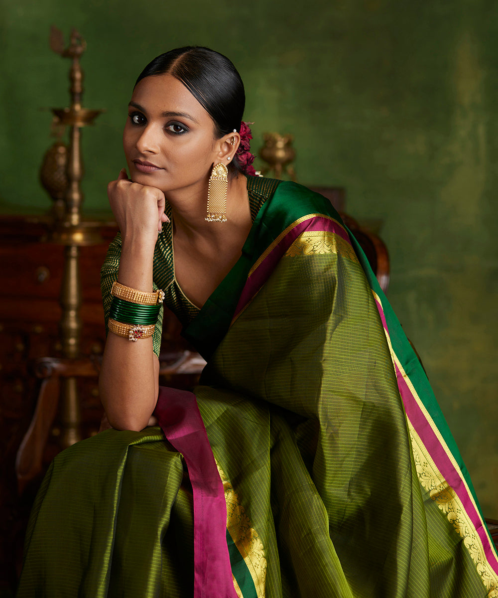 Handloom_Heena_Green_Pure_Silk_Kanjivaram_Saree_With_Double_Color_Big_Border_WeaverStory_01