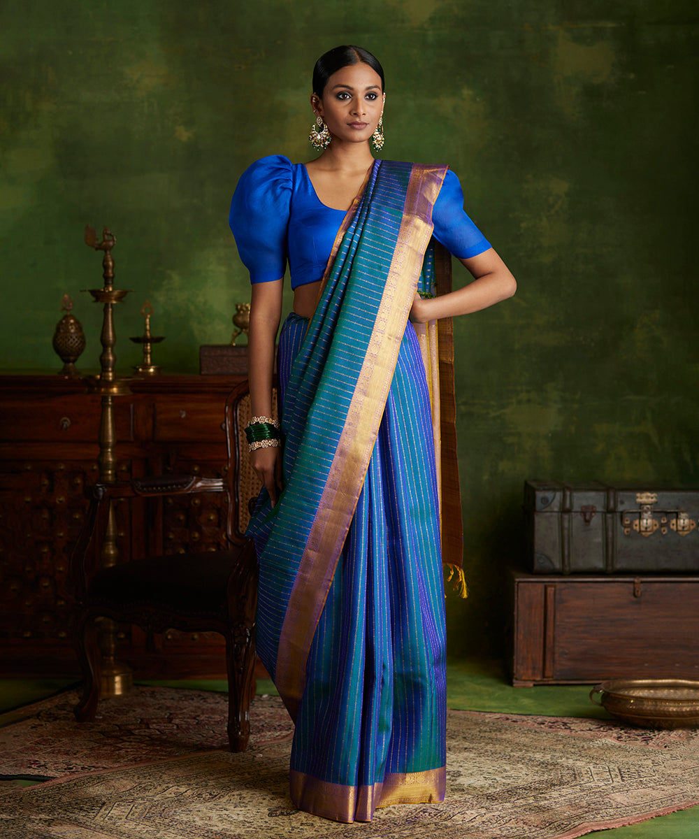 Peacock_Blue_Handloom_Pure_Zari_Kanjivaram_Saree_With_Purple_And_Gold_Border_WeaverStory_02