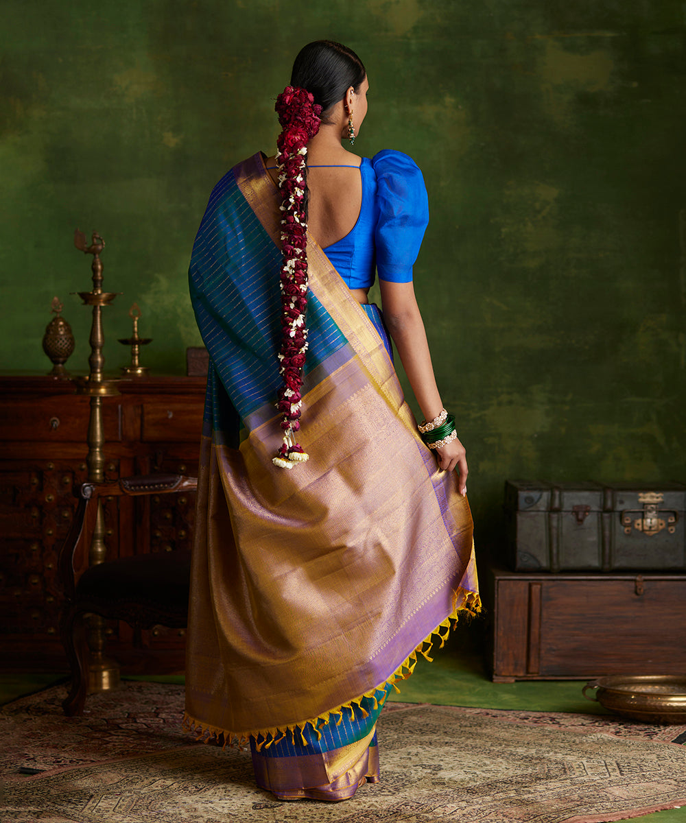 Peacock_Blue_Handloom_Pure_Zari_Kanjivaram_Saree_With_Purple_And_Gold_Border_WeaverStory_03