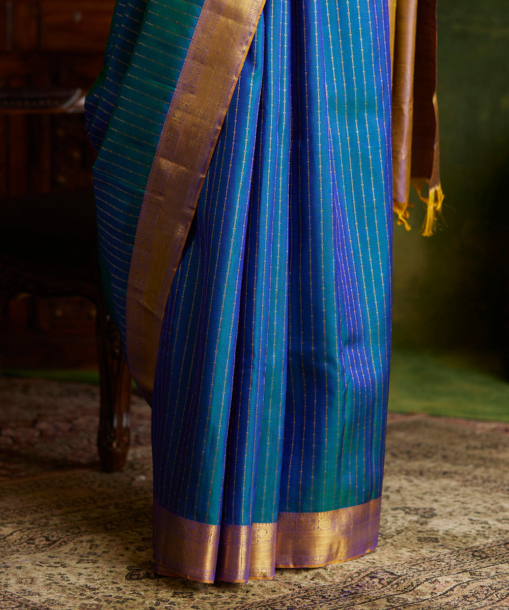 Peacock_Blue_Handloom_Pure_Zari_Kanjivaram_Saree_With_Purple_And_Gold_Border_WeaverStory_04