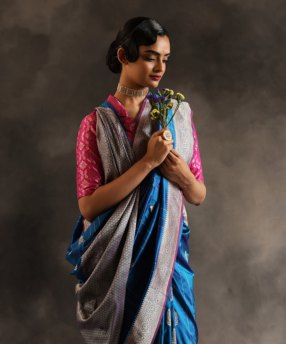 Peacock_Blue_Handloom_Pure_Katan_Silk_Banarasi_Saree_With_Kadhwa_Booti_And_Vertical_Zari_Stripes_WeaverStory_01