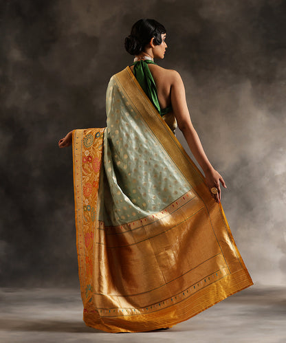 Handloom_Light_Blue_Pure_Katan_Silk_Banarasi_Saree_With_Zari_Booti_And_Yellow_Kadhiyal_Border_WeaverStory_03