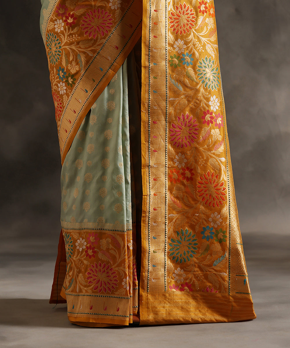 Handloom_Light_Blue_Pure_Katan_Silk_Banarasi_Saree_With_Zari_Booti_And_Yellow_Kadhiyal_Border_WeaverStory_04