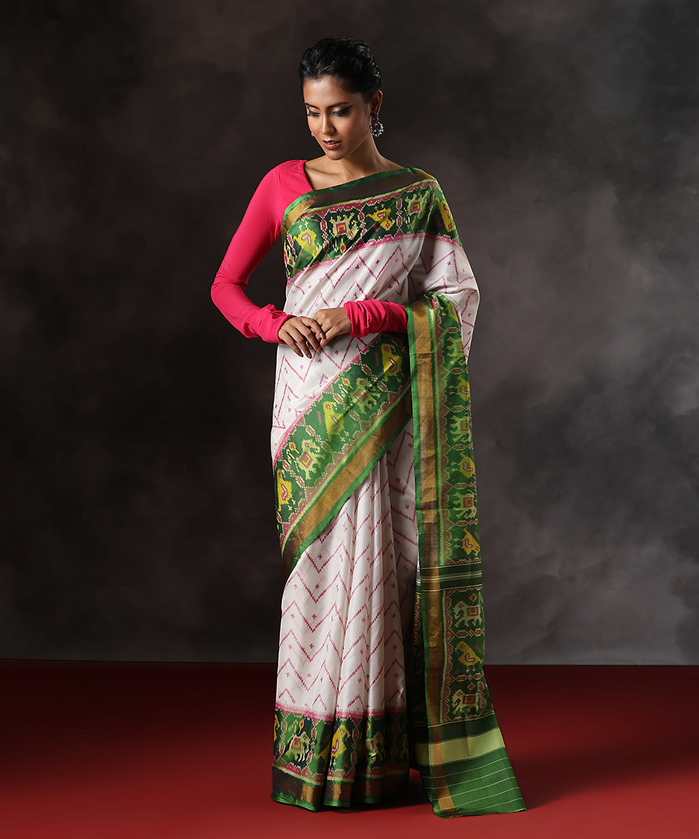 Handloom_Green_And_White_Pure_Mulbery_Silk_Single_Ikat_Patola_Saree_With_Tissue_Border_WeaverStory_02