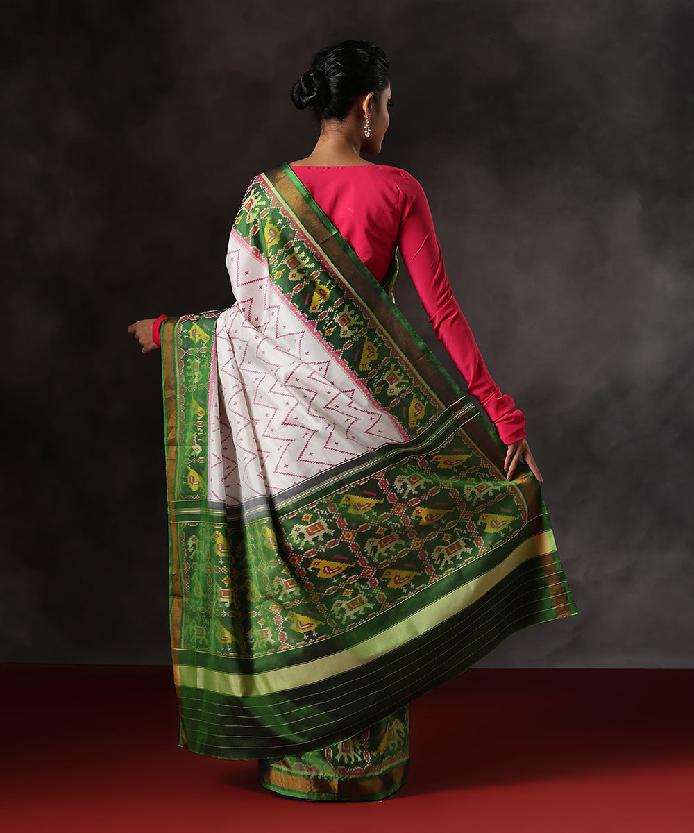 Handloom_Green_And_White_Pure_Mulbery_Silk_Single_Ikat_Patola_Saree_With_Tissue_Border_WeaverStory_03