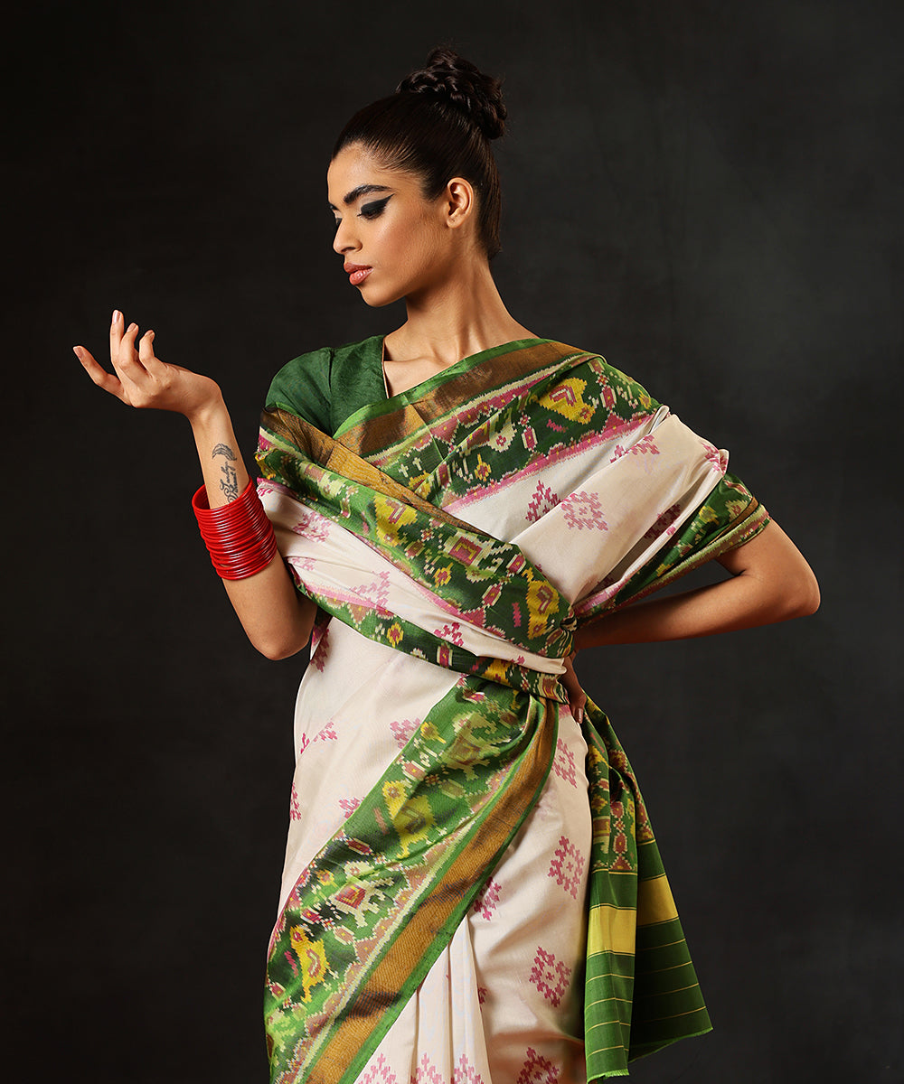 HandloomGreen_And_White_Pure_Mulberry_Silk_Single_Ikat_Patola_Saree_With_Tissue_Border_WeaverStory_01