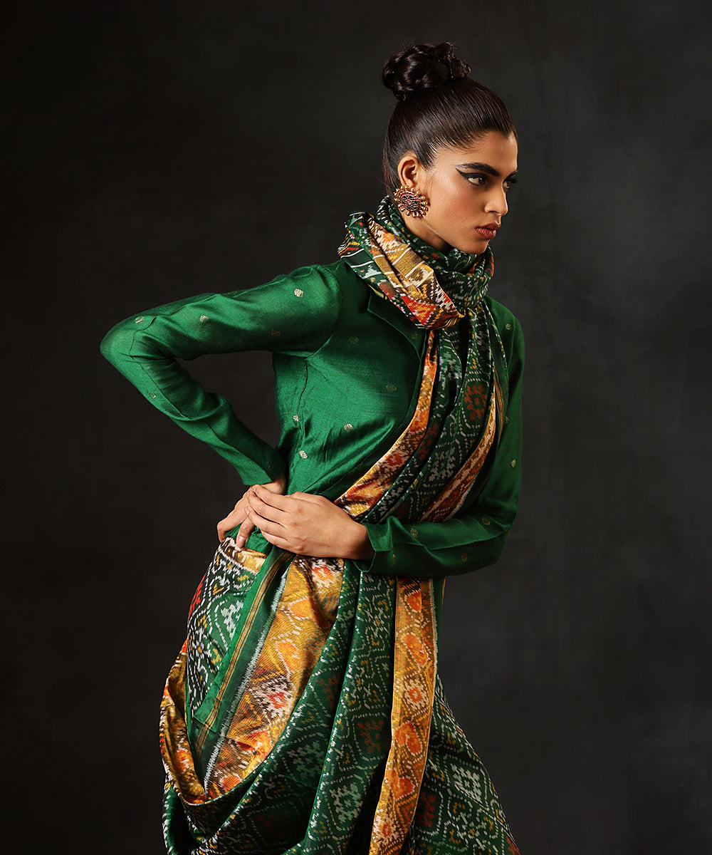 Dark_Green_Handloom_Pure_Mulberry_Silk_Single_Ikat_Patola_Saree_With_Mustard_TissueBorder_WeaverStory_01