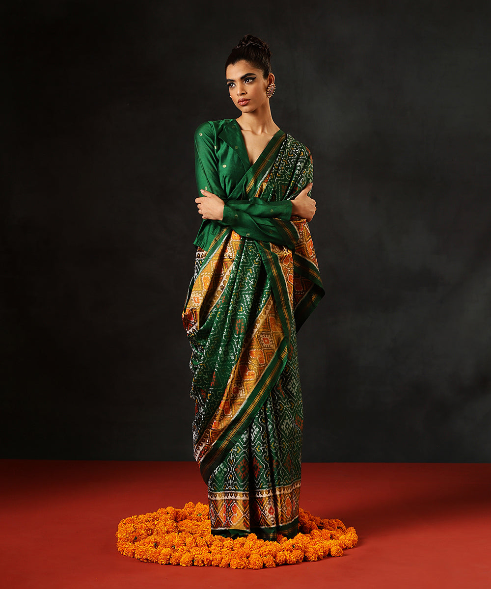 Dark_Green_Handloom_Pure_Mulberry_Silk_Single_Ikat_Patola_Saree_With_Mustard_TissueBorder_WeaverStory_02