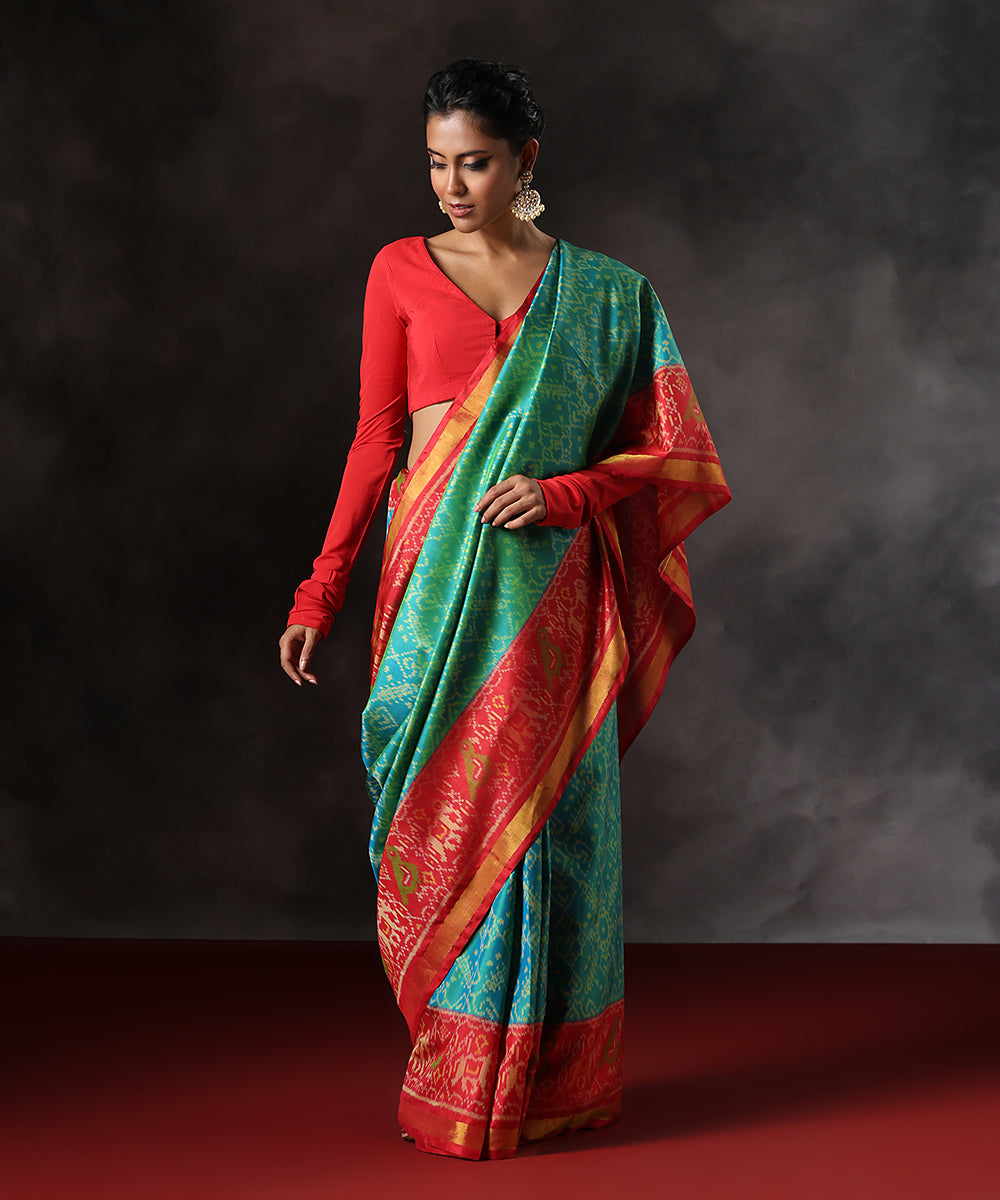 Teal_Green_Double_Shade_Handloom_Pure_Mulbery_Silk_Patola_Single_Ikat_Saree_With_Red_Border_WeaverStory_02