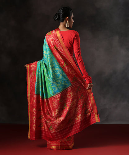 Teal_Green_Double_Shade_Handloom_Pure_Mulbery_Silk_Patola_Single_Ikat_Saree_With_Red_Border_WeaverStory_03