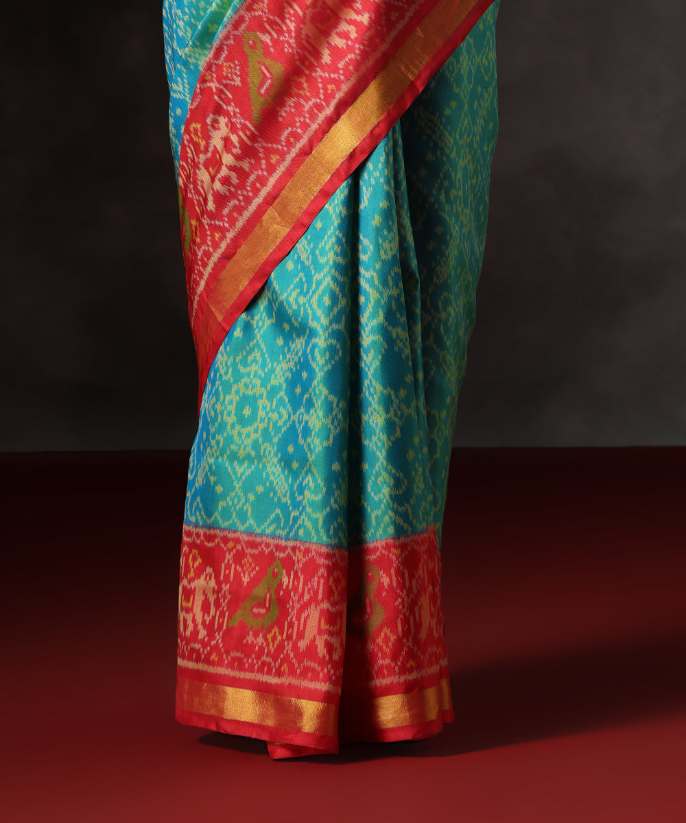 Teal_Green_Double_Shade_Handloom_Pure_Mulbery_Silk_Patola_Single_Ikat_Saree_With_Red_Border_WeaverStory_04