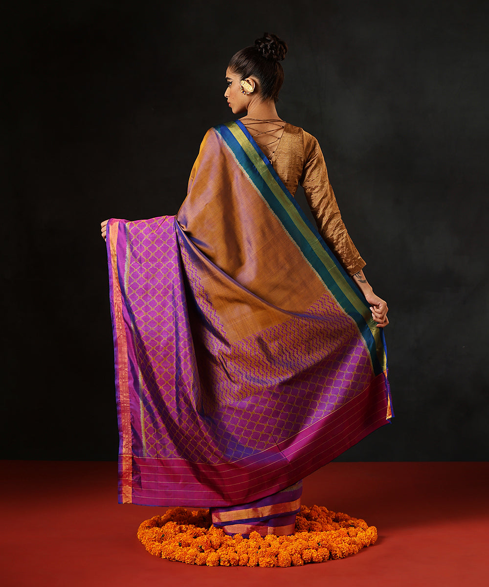 Purple_And_Brown_Handloom_Pure_Mulberry_Silk_Single_Ikat_Patola_Saree_With_Gold_Border_WeaverStory_03