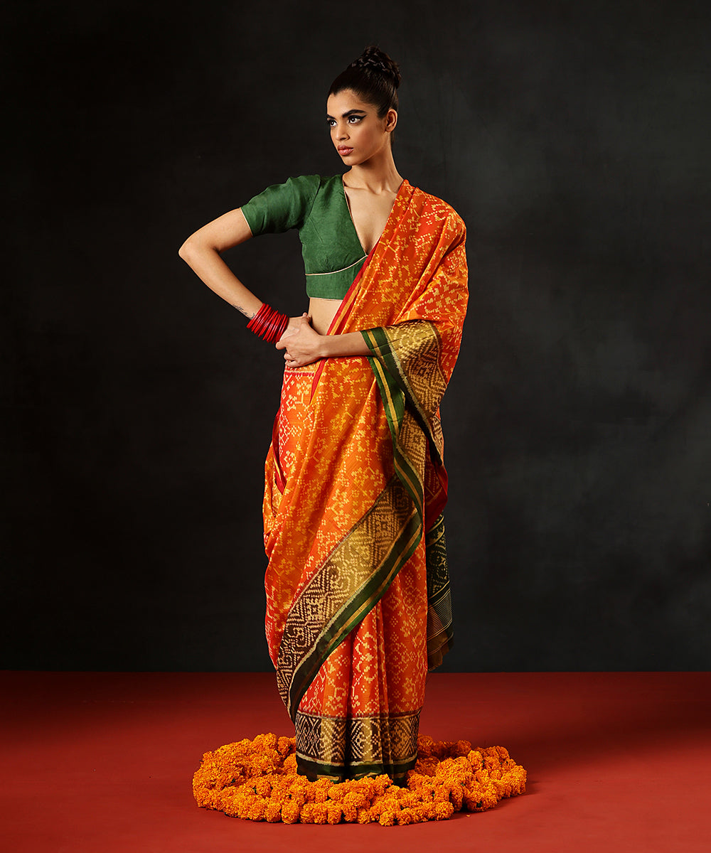 Handloom_Orange_Double_Shade_Pure_Mulberry_Silk_Single_Ikat_Patola_Saree_WithGreen_Pallu_And_Tissue_Border_WeaverStory_02