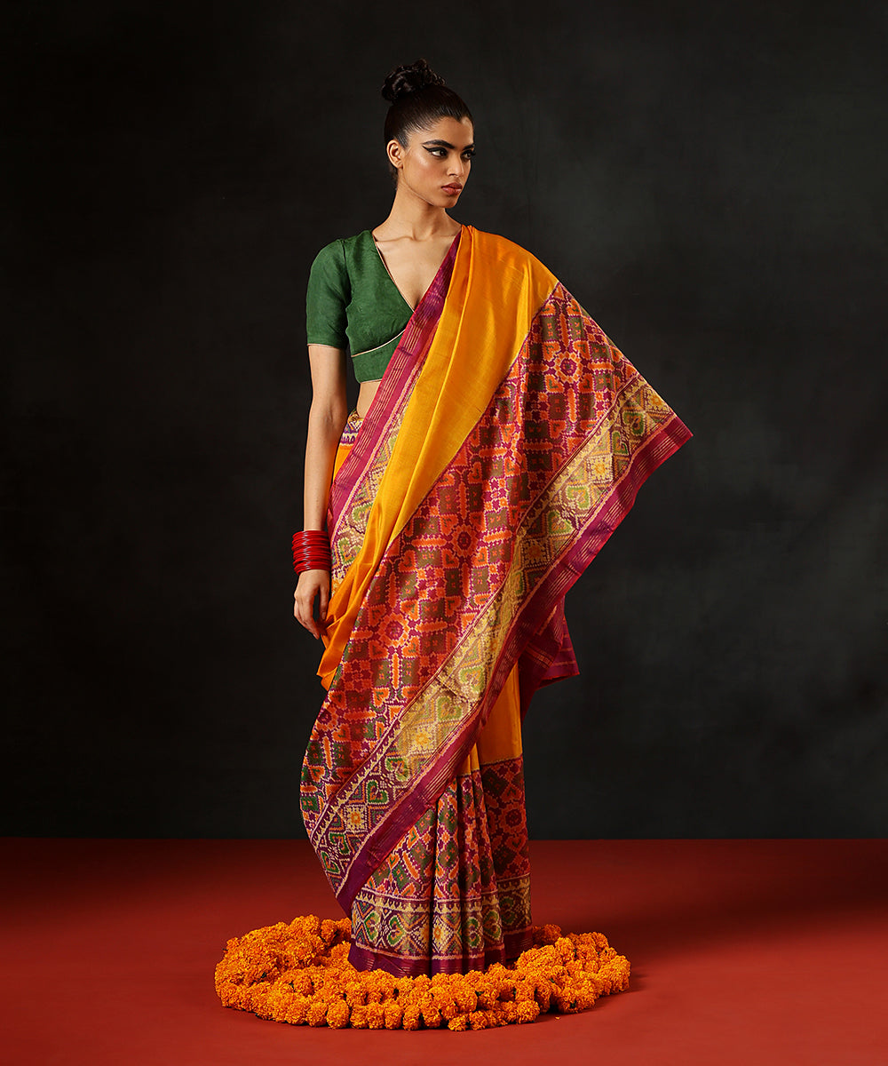 Mustard_Handloom_Pure_Mulberry_Silk_Single_Ikat_Patola_Saree_With_PurpleTissue_Border_And_Pallu_WeaverStory_02