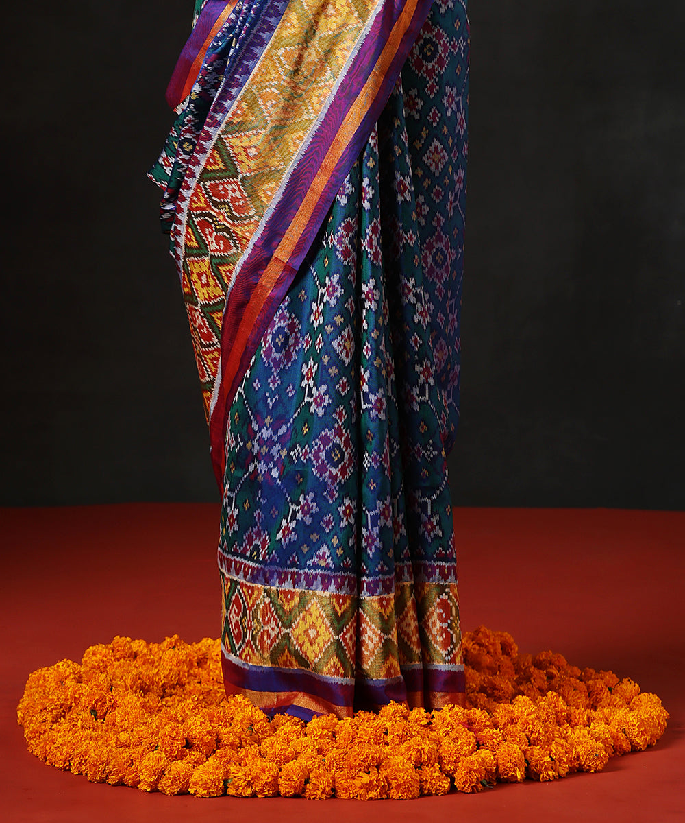 Handloom_Green_And_Purple_Dual_Tone_PureMulberry_Silk_Single_Ikat_Patola_Saree_With_TissueBorder_WeaverStory_04