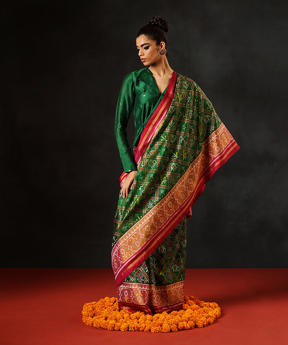 Green_Handloom_PureMulberry_Silk_Single_Ikat_Patola_Saree_With_Pink_Tissue_Border_WeaverStory_02