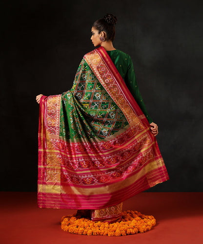 Green_Handloom_PureMulberry_Silk_Single_Ikat_Patola_Saree_With_Pink_Tissue_Border_WeaverStory_03