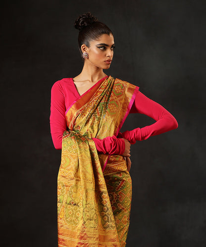 Mustard_And_Green_Handloom_Tissue_Silk_Patola_Saree_With_Pink_Tissue_Border_WeaverStory_01