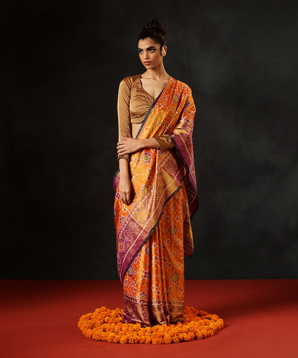 Handloom_Orange_And_Lavender_Tissue_Silk_Single_Ikat_Patola_Saree_With_Green_Selvedge_WeaverStory_02