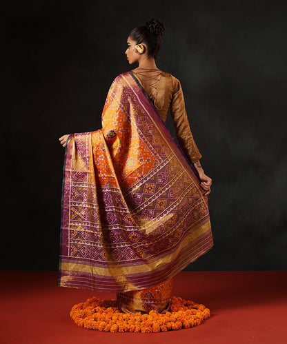 Handloom_Orange_And_Lavender_Tissue_Silk_Single_Ikat_Patola_Saree_With_Green_Selvedge_WeaverStory_03