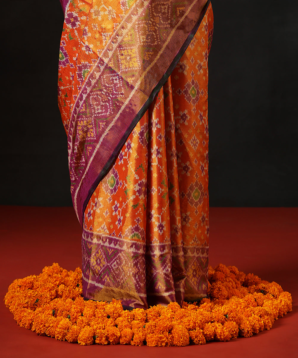 Handloom_Orange_And_Lavender_Tissue_Silk_Single_Ikat_Patola_Saree_With_Green_Selvedge_WeaverStory_04