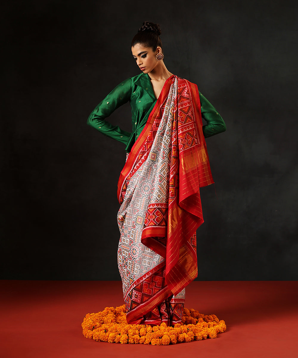 Handloom_White_Pure_MulberrySilk_Single_Ikat_Patola_Saree_With_Maroon_Border_WeaverStory_02