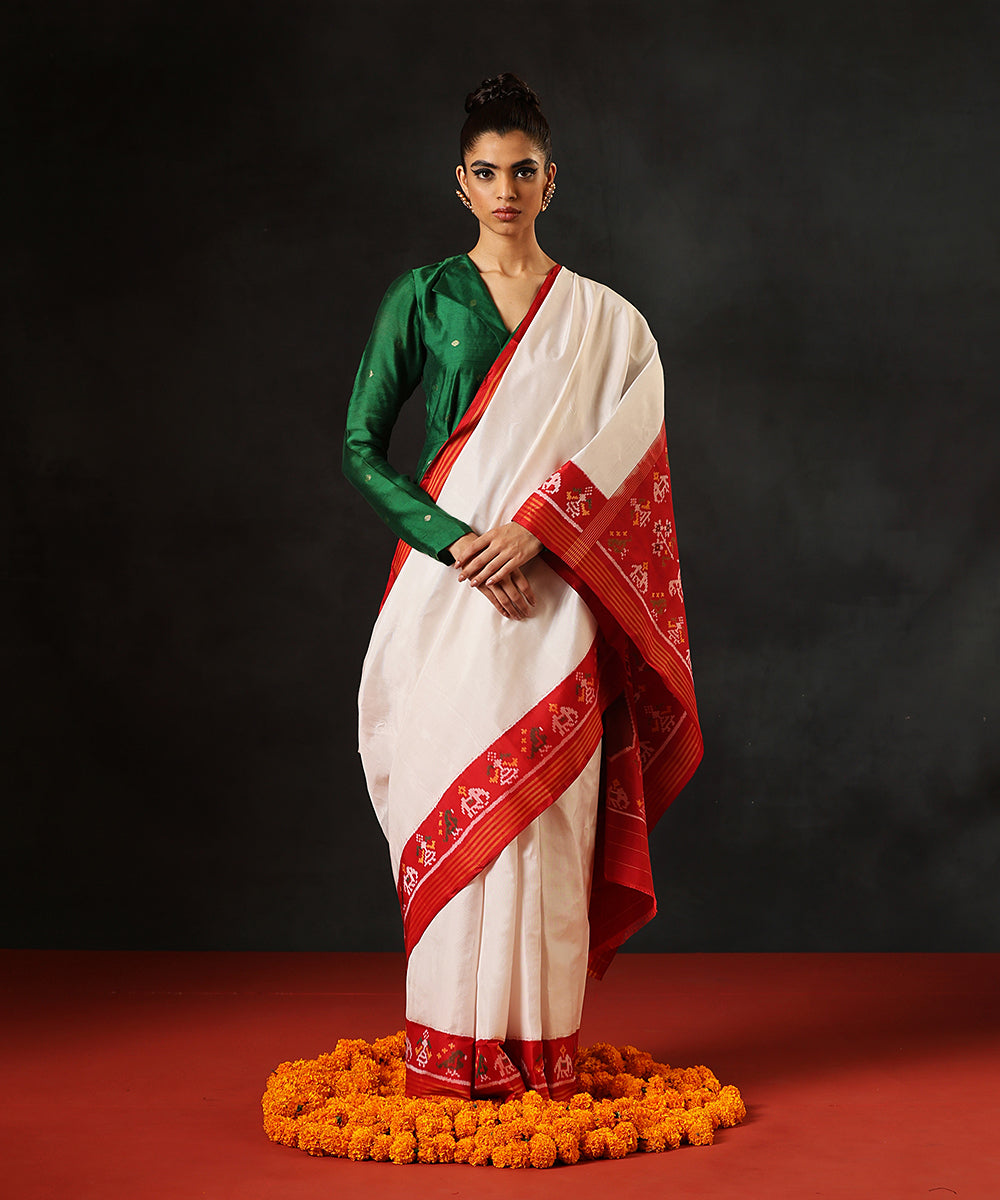 Handloom_White_Pure_Mulberry_Silk_Single_Ikat_Patola_Saree_With_Red_Border_And_Pallu_With_Elephant_Motifs_WeaverStory_02