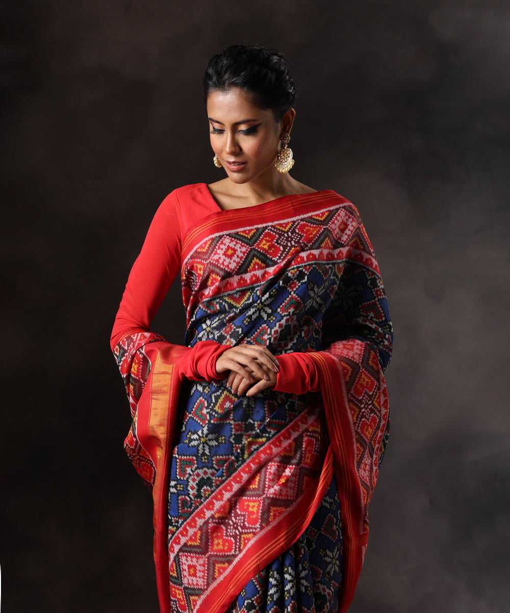 Handloom_Blue_Pure_Mulbery_Silk_Single_Ikat_Patola_Saree_With_Red_Border_WeaverStory_01