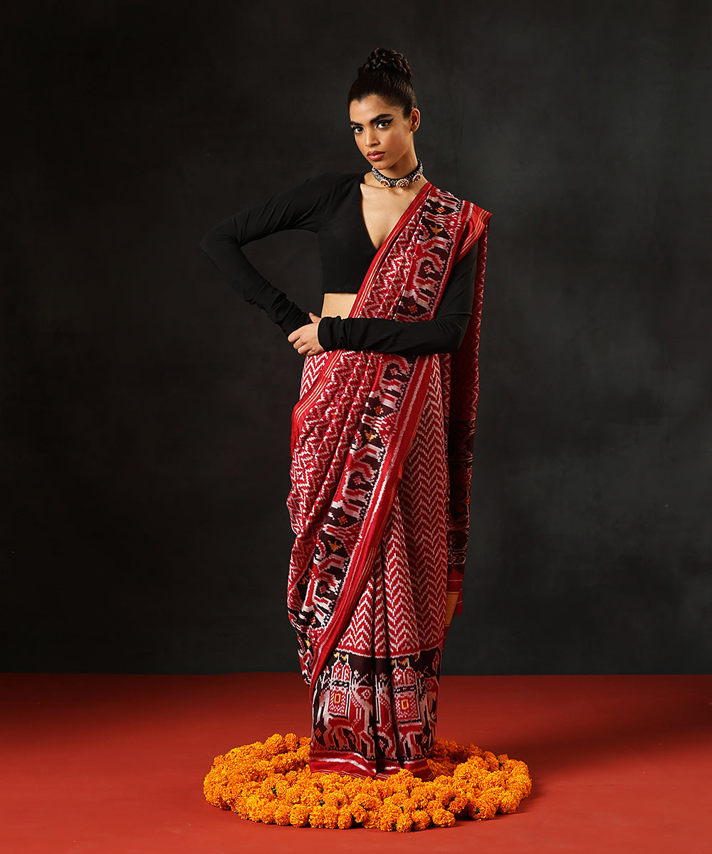 Maroon_Handloom_Pure_Mulberry_Silk_Single_Ikat_Patola_Saree_With_Dark_Maroon_Elephant_Border_WeaverStory_02