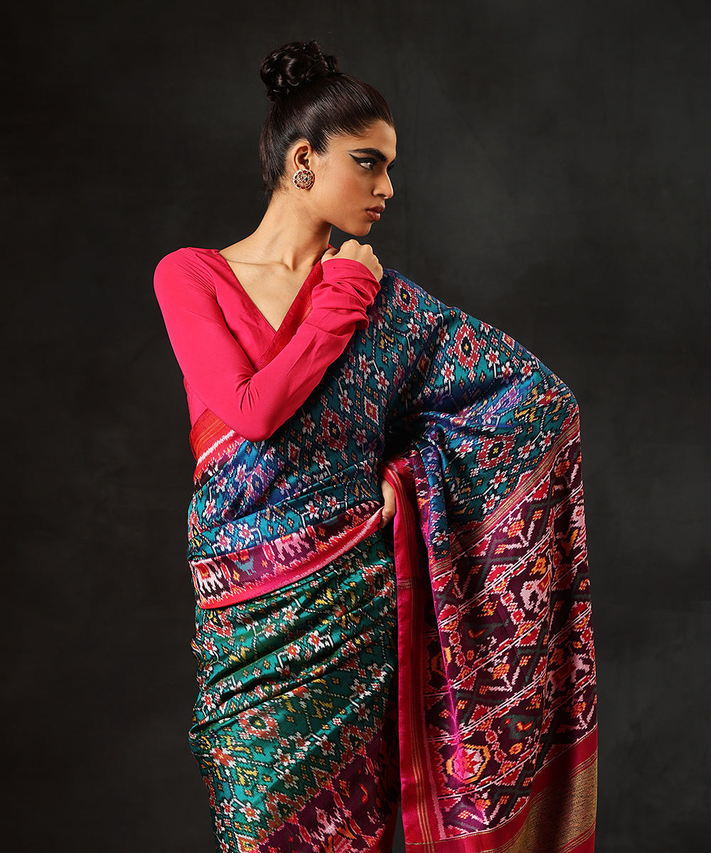 Handloom_Teal_Blue_And_Green_Double_Wear_Pure_Mulberry_Silk_Ikat_PatolaPatola_Saree_With_Pink_Border_WeaverStory_01