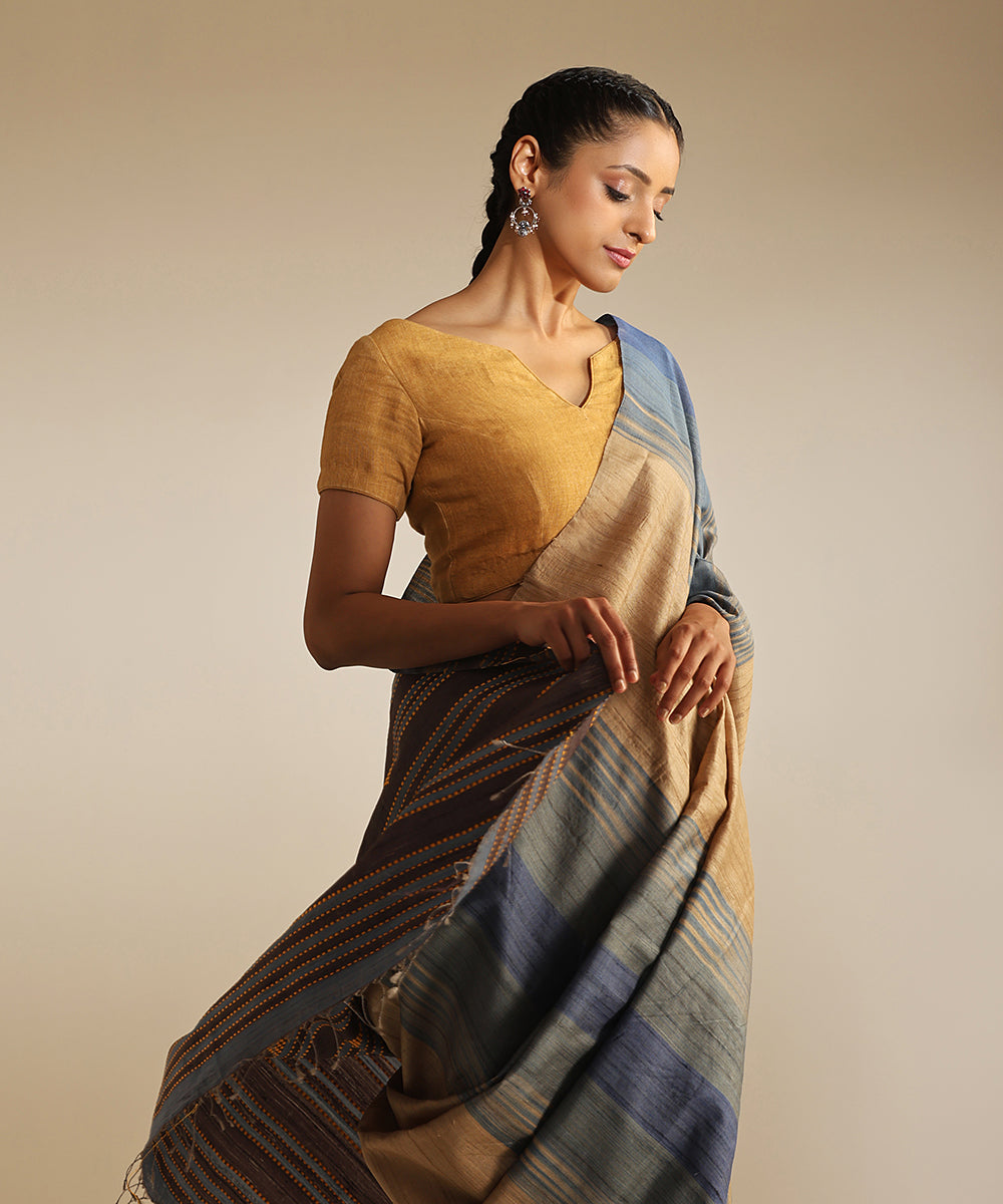 Handloom_Beige_And_Blue_Handspun_Tussar_Silk_Saree_With_Extra_Weft_WeaverStory_01