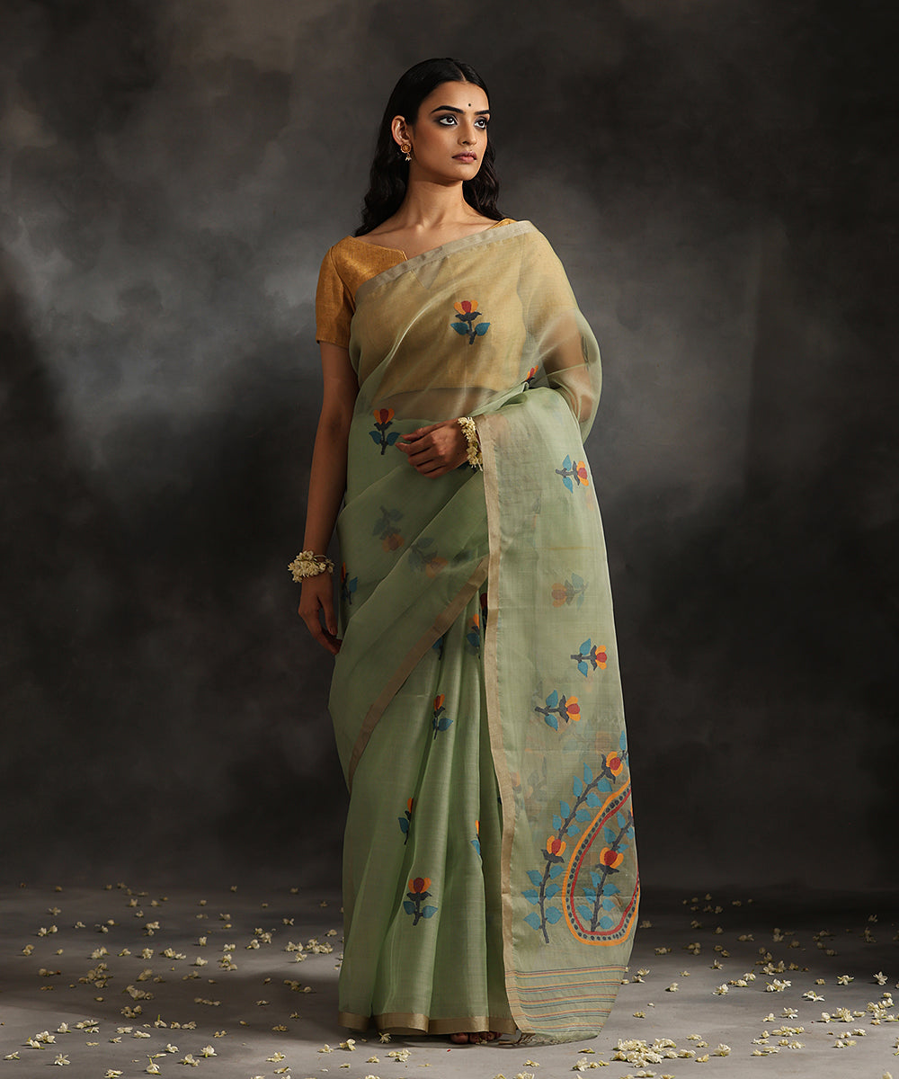 Pistachio_Green_Handloom_Pure_Kora_Silk_Muslin_Dhakai_Jamdani_Saree_With_Blue_Leaves_WeaverStory_02