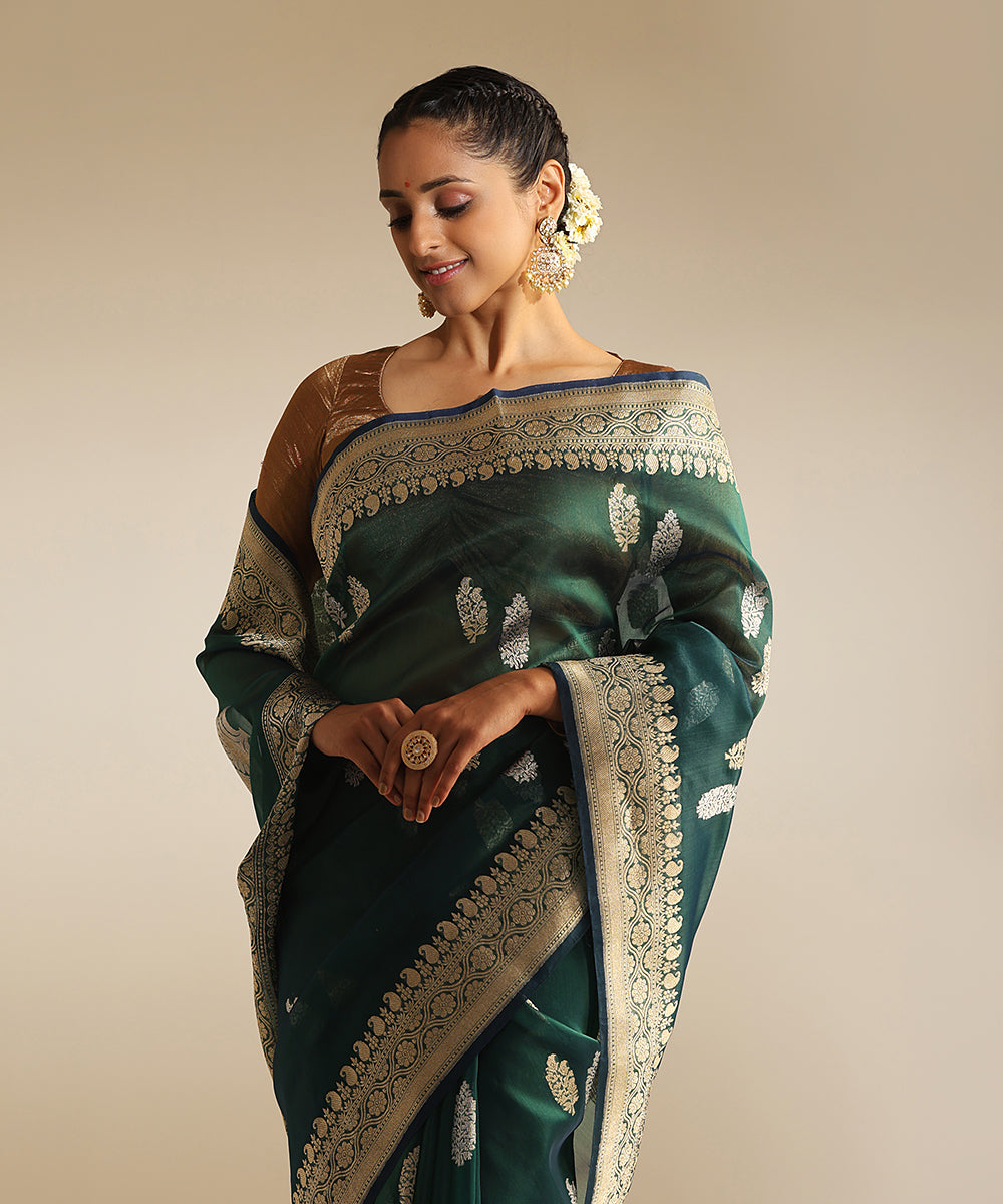 Handloom_Bottle_Green_Pure_Kora_Silk_Banarasi_Saree_With_Silver_And_Gold_Kadhwa_Booti_WeaverStory_01