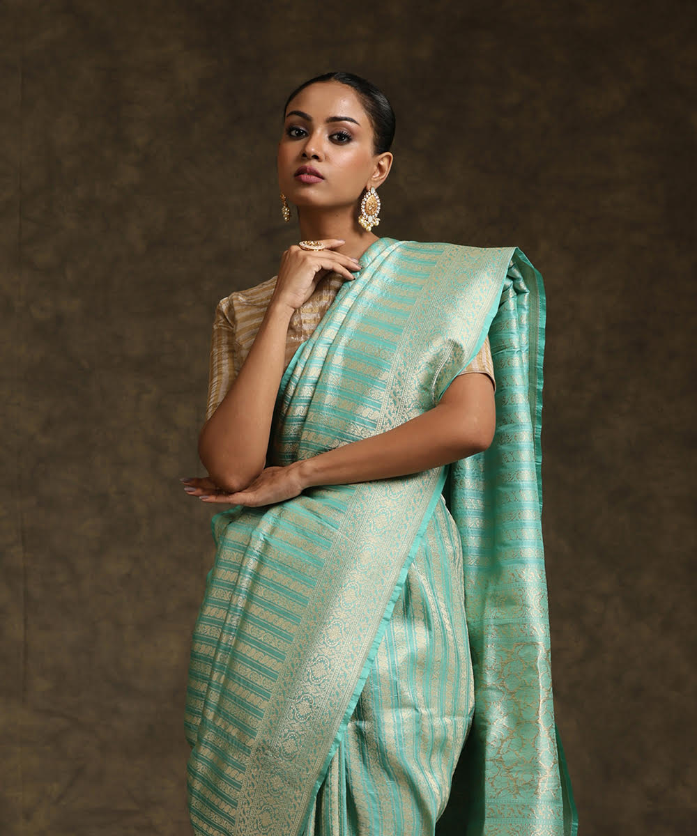 Mint_Green_Handloom_Pure_Katan_Silk_Banarasi_Saree_With_All_Over_Zari_Stripes_And_Border_WeaverStory_01