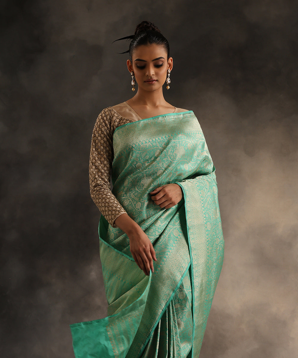 Handloom_Turquoise_Pure_Katan_Silk_Shikargah_Banarasi_Saree_WeaverStory_01