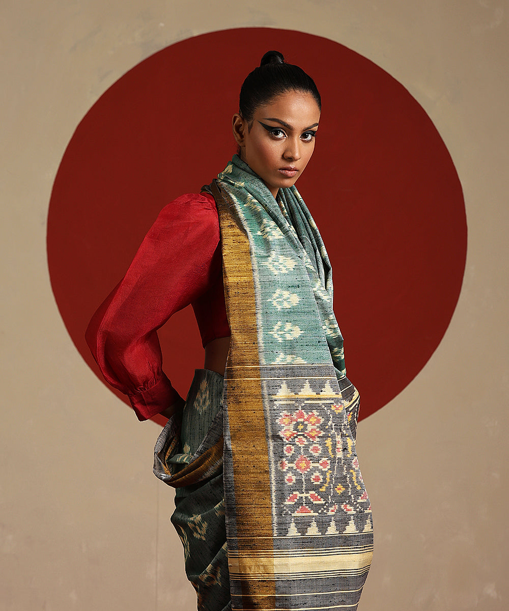 Pastel_Green_And_Grey_Double_Shade_Handloom_Pure_Raw_Silk_Ikat_Patola_Saree_WeaverStory_01