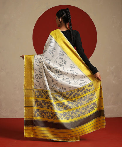 Handloom_Offwhite_And_Yellow_Pure_Mulberry_Silk_Single_Ikat_Patola_Saree_WeaverStory_03