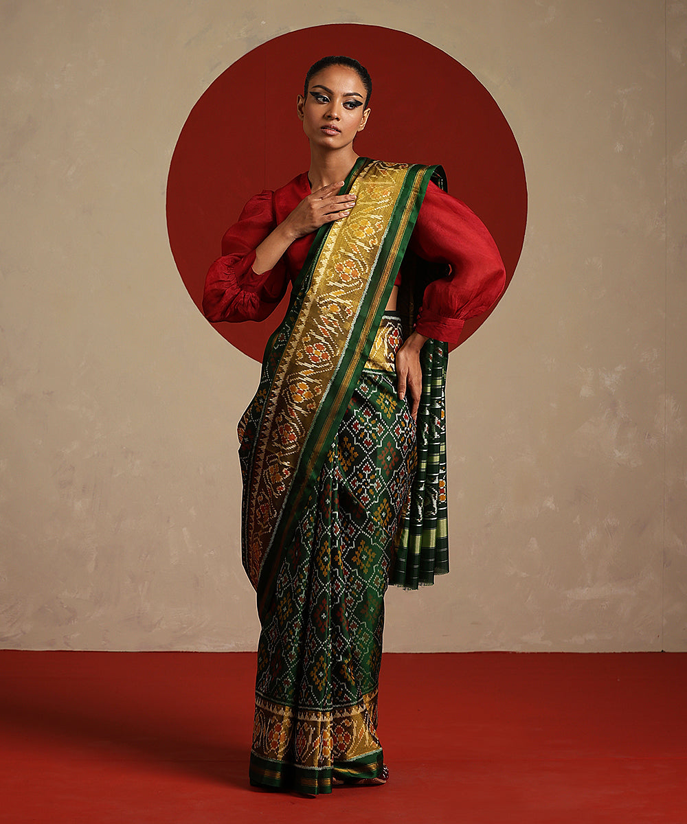 Handloom_Green_And_Mustard_Pure_Mulberry_Silk_Ikat_Patola_Saree_WeaverStory_02