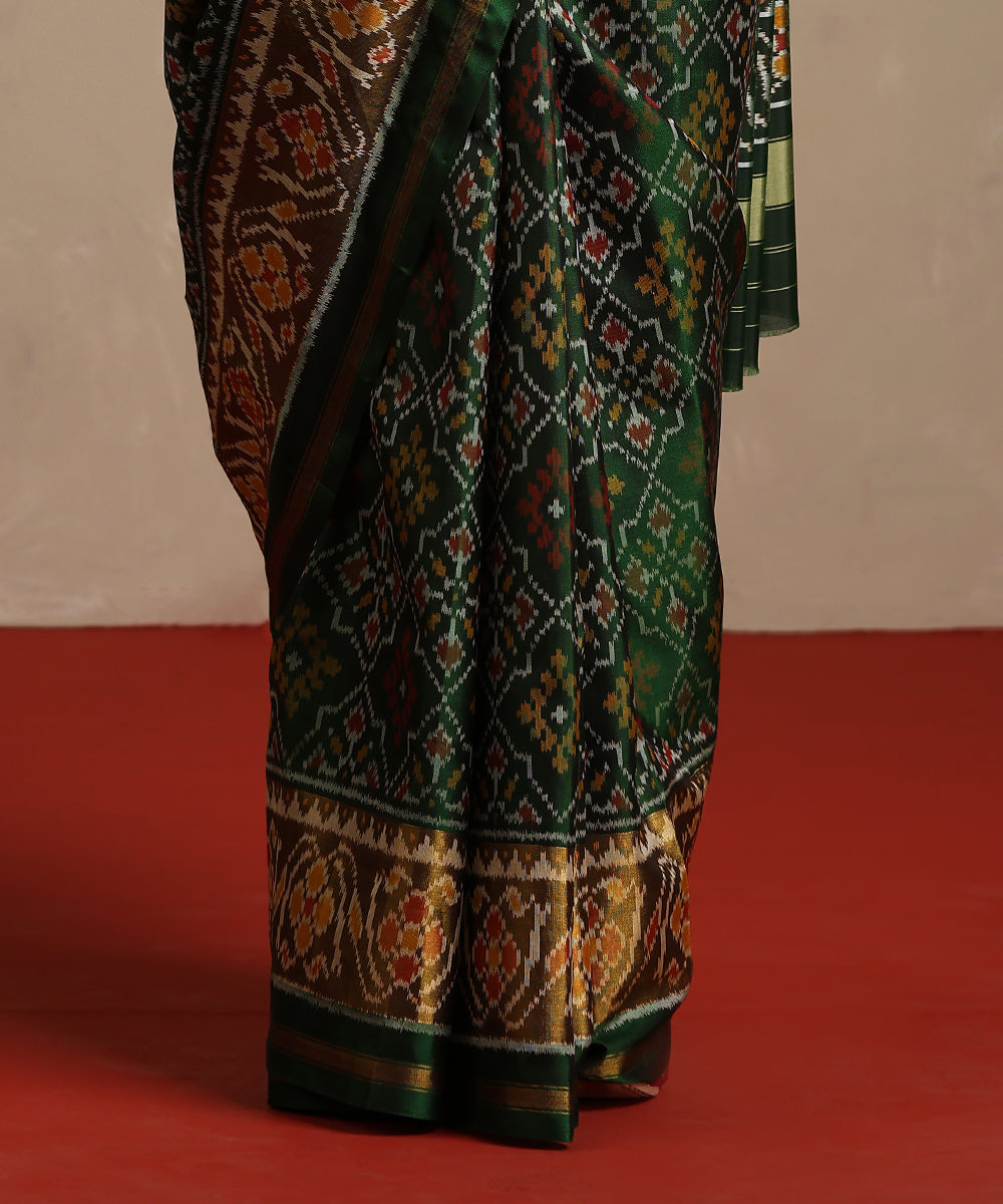 Handloom_Green_And_Mustard_Pure_Mulberry_Silk_Ikat_Patola_Saree_WeaverStory_04