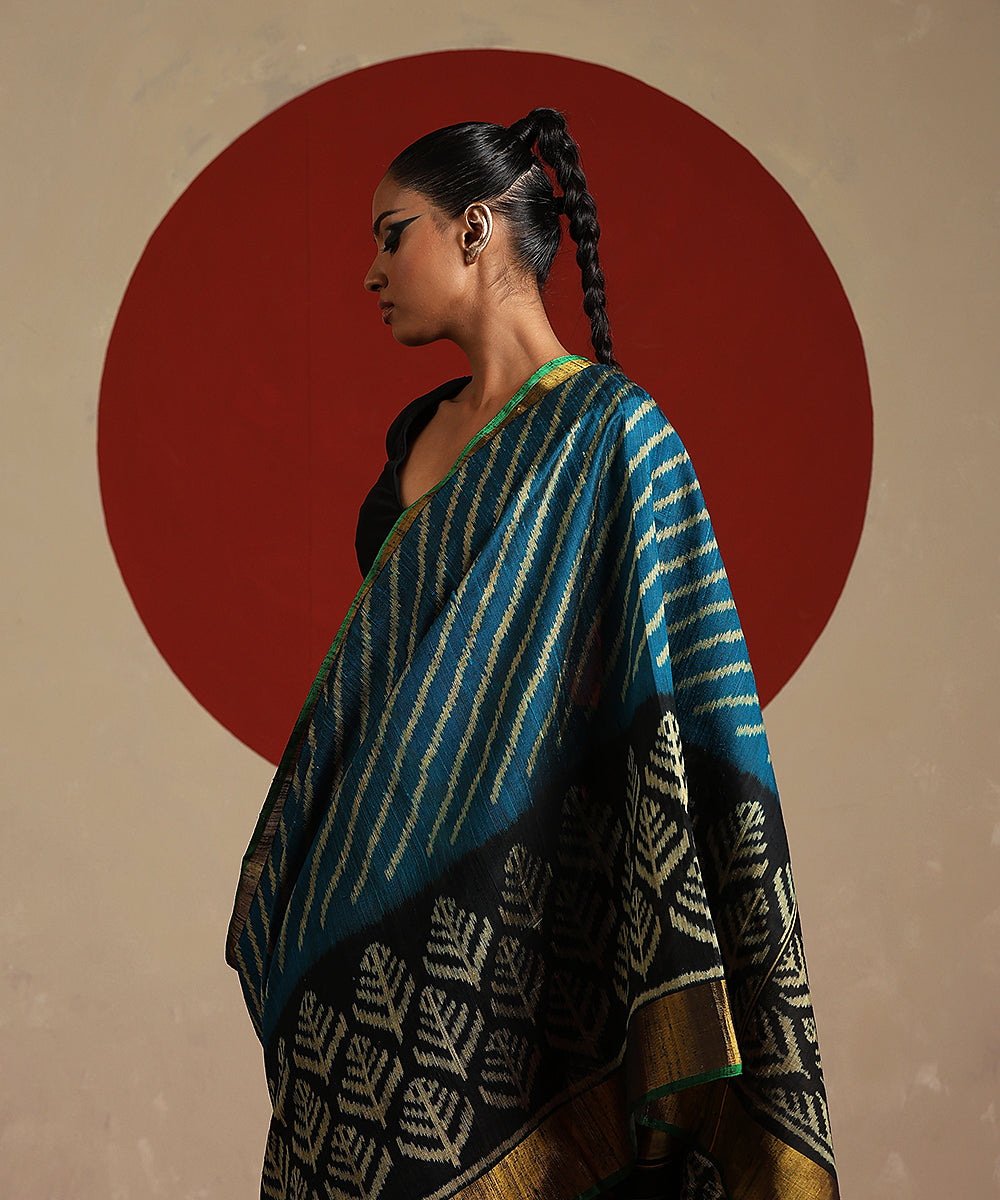 Handloom_Teal_And_Black_Double_Shade_Raw_Silk_Single_Ikat_Patola_Saree_WeaverStory_01