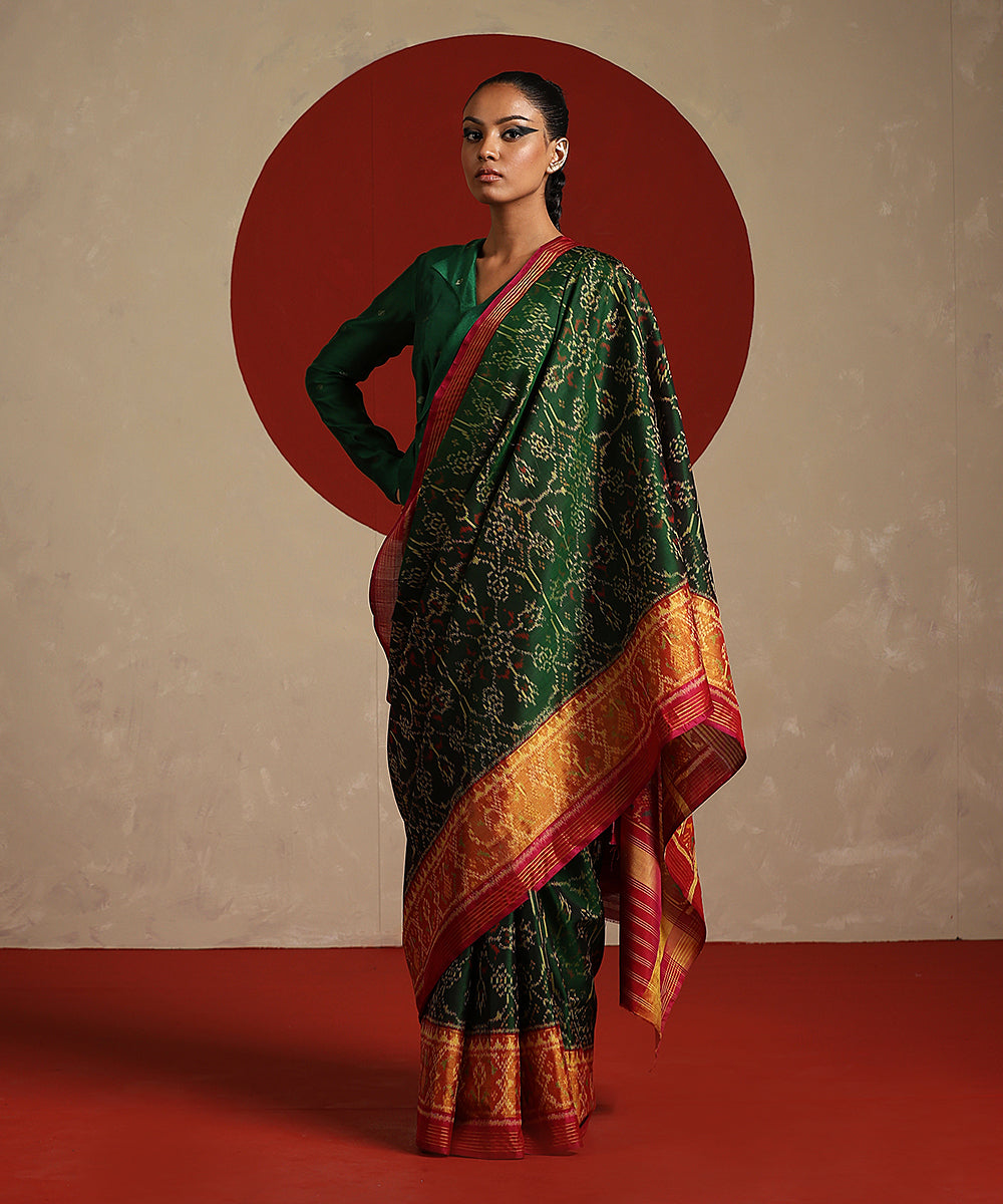 Green_And_Rani_Pink_Double_Shade_Handloom_Pure_Mulberry_Silk_Ikat_Patola_Saree_WeaverStory_02