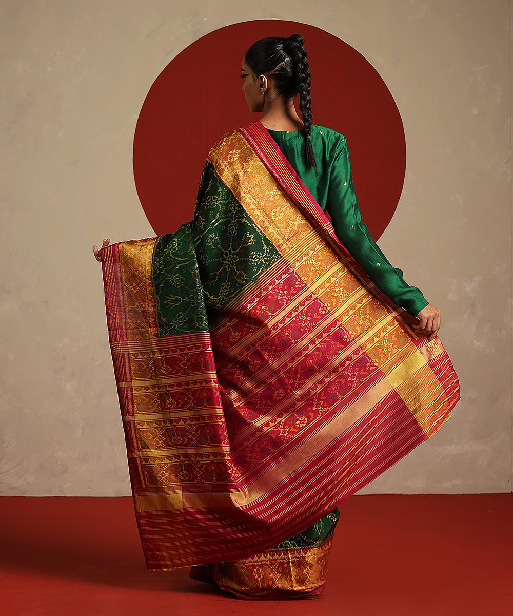 Green_And_Rani_Pink_Double_Shade_Handloom_Pure_Mulberry_Silk_Ikat_Patola_Saree_WeaverStory_03