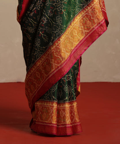 Green_And_Rani_Pink_Double_Shade_Handloom_Pure_Mulberry_Silk_Ikat_Patola_Saree_WeaverStory_04